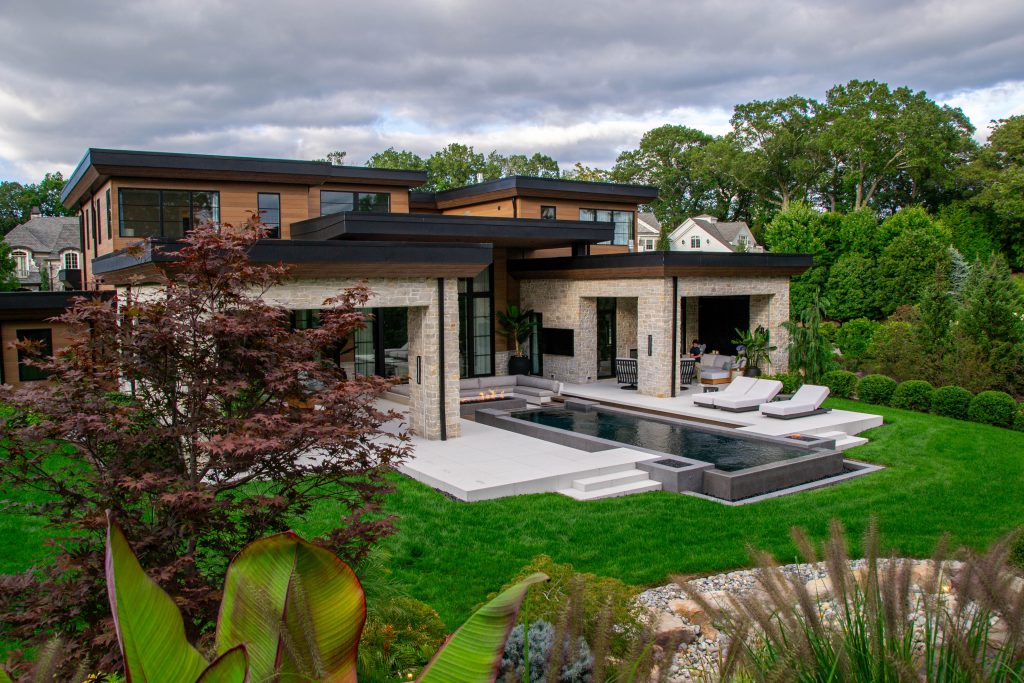 NJ modern home and pool backyard design for year round enjoyment